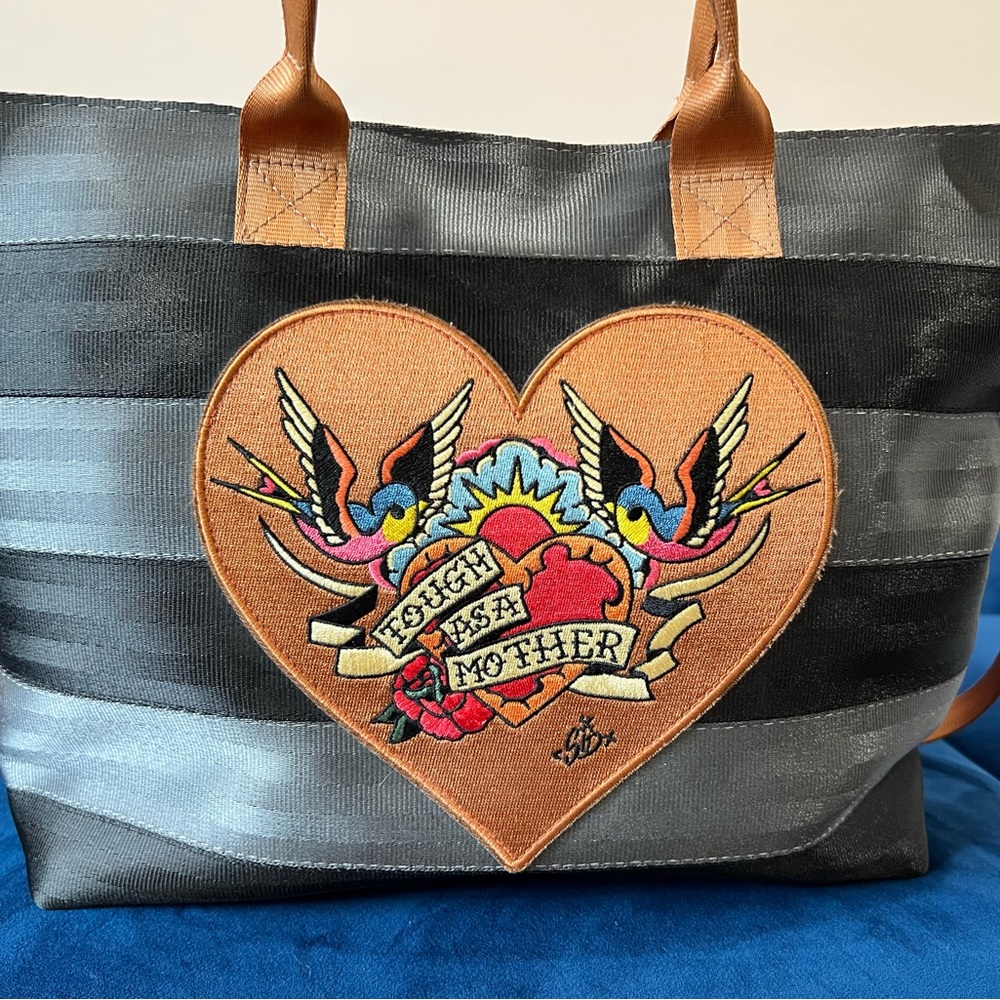 Harveys Black and Gray “Tough As A Mother” tote bag.